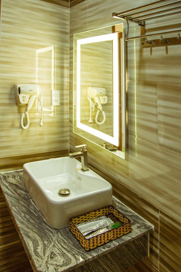 הו צ'י מין סיטי Green Hotel Vinh Loc מראה חיצוני תמונה